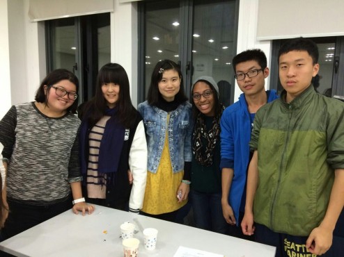 Briana and a group of SUFE students at a club event called the English Corner