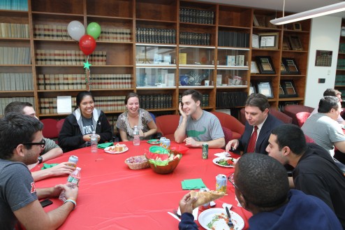 Leadership students sharing their culturally Italian meal with faculty member, Dr. Dan-o Photo courtesy of Mike Reuter