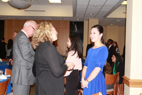 Sophomore Ara Barotilla excitedly conversing with executives Photo courtesy of Mike Reuter