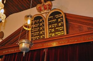 an Eternal Light (ner tamid) hangs above or near the ark in a synagogue