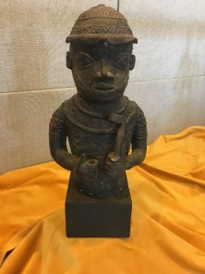 Small reproduction statue of a Benin Courtier from the waist up