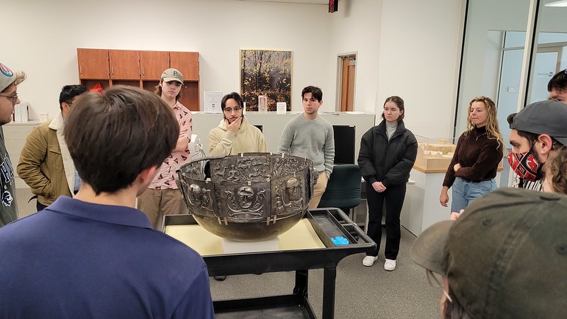 image of students viewing artifact