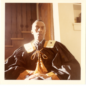 Dr. Hammond in academic robes.