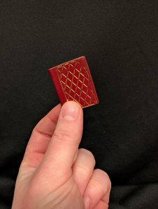 The red leather cover with gold inlay of the facsimile called Masses of Saint Francis of Assisi and Saint Anne