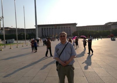 In Tiananmen Square with The Great Hall of the People in the background