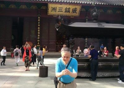 Burning incense and praying in Lingyin Temple