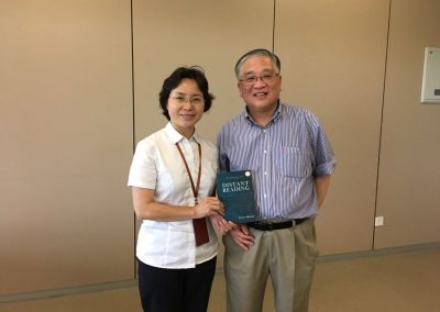 With Ms. Wanfen Zou (邹婉芬), Research Librarian of Pudong Library after my book donation of "Distant Reading" by Franco Moretti