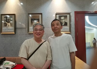 Mr. Chen Huang (黄晨), CADAL conference organizer and Deputy Director of Zhejiang University Library and Xue-Ming Bao (包学鸣 left)