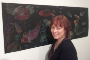 Jill with her award-winning contribution to the 2014 Seton Hall art show.