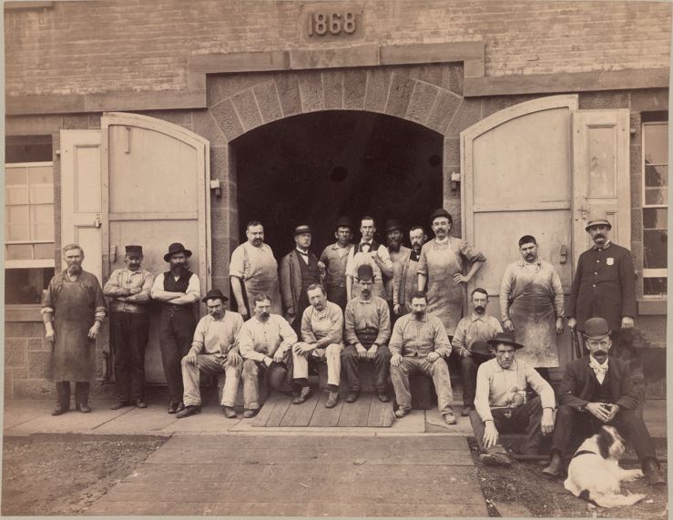 The Workshop building in 1890 with workers posing for the picture