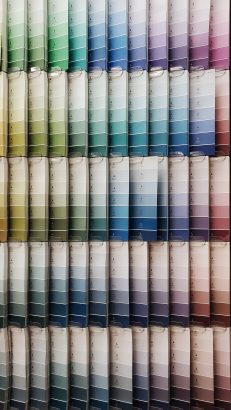 A wall of paint swatches