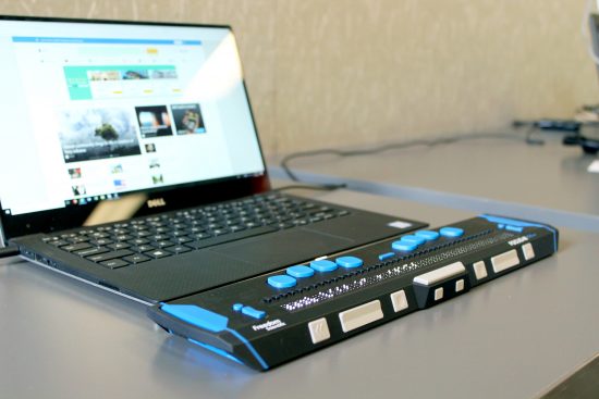 A computer with a refreshable braille display