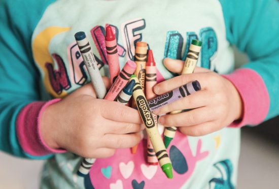 Image of Kid with Crayons