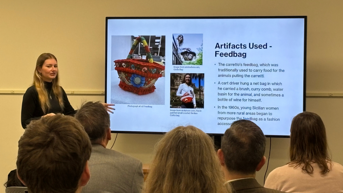 student presenting her Time Machines project on a Sicilian feed bag