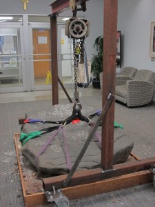 After some clean up, the petroglyph is strapped, lifted, and ready to be wheeled across campus. 