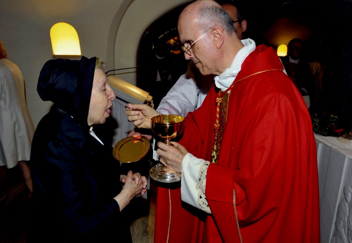 Sister Marchione in her nun's habit meeting Pope Pius XII in his characteristic red tabard