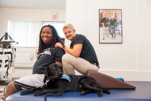 A GOOD TEAM: Wojciehowski, LeGrand and therapy dog Willie.