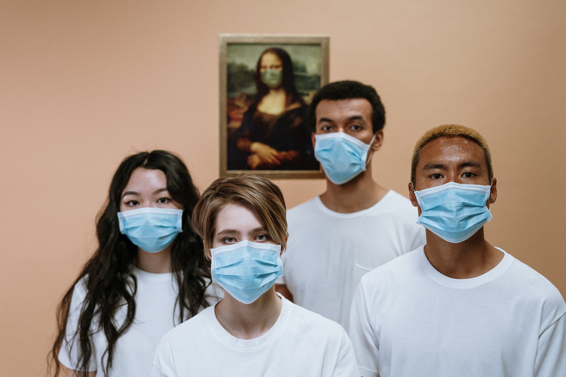 People in Masks in Museum