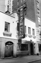 Stonewall Inn in 1969. It was an open gay bar with a sign on the window that stated, "We homosexuals plead with our people to please help maintain peaceful and quiet conduct on the streets of the Village."