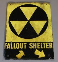 Fallout Shelter signs were posted indoors and outdoors to let people know that these buildings are available for shelter from warfare