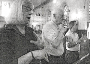 Photo of deaf persons attending mass.